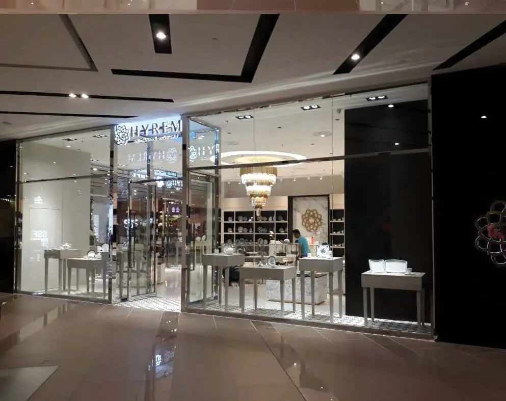 HYREMID showroom interior seen through the glass shopfront