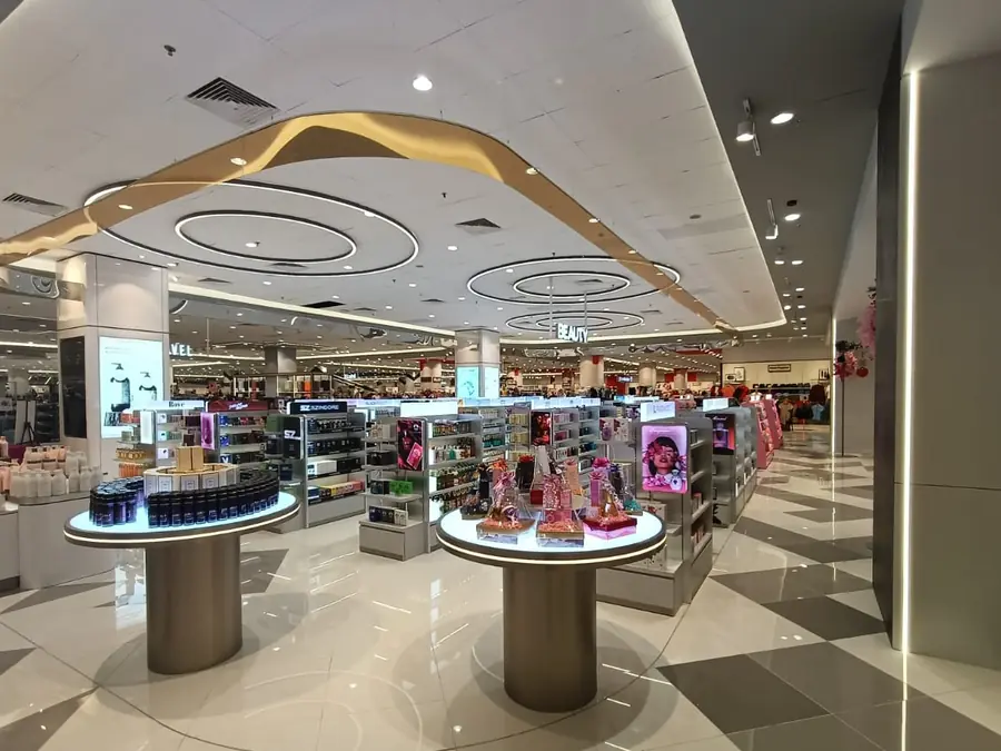 Retail counters with feature lighting and ceiling light rings